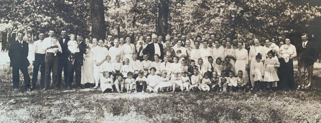 a large family photograph in black and white