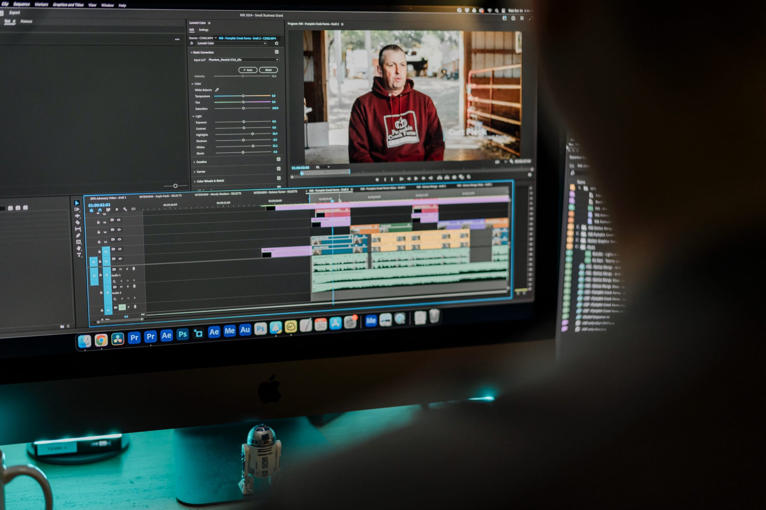 a video editor works on non-linear video editing software